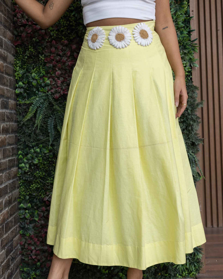 Yellow high-waisted midi sunflower skirt with three white sunflower appliqués at the waist